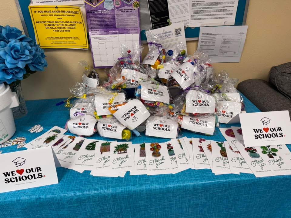 Goodie bags with notes reading We love our schools